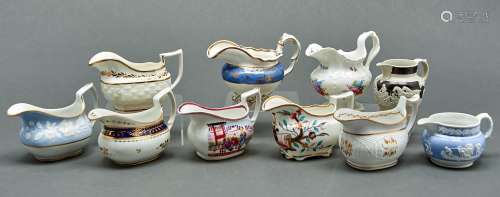 A study collection of nine English porcelain cream jugs, ear...