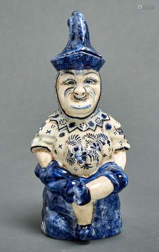 A Delft style blue and white earthenware Toby jug and cover,...