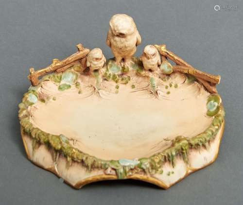 An Austrian porcelain dish, c1910, the rim set with an owl a...