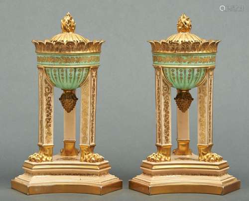 A pair of French porcelain brule parfums and covers, mid 19t...