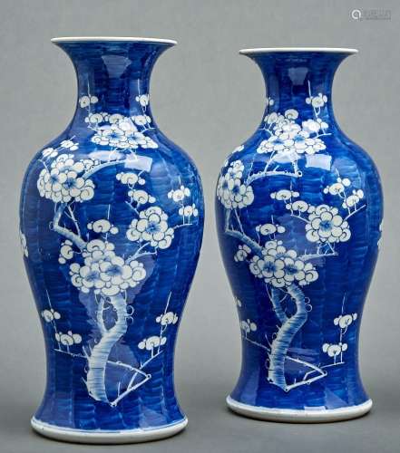 A pair of Chinese blue and white prunus-on-cracked-ice vases...