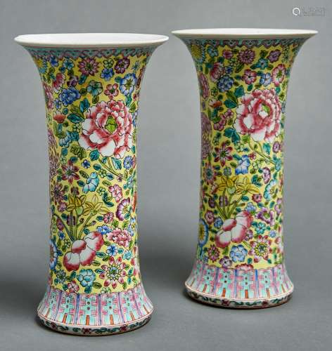 A pair of Chinese yellow ground famille rose sleeve vases, 2...
