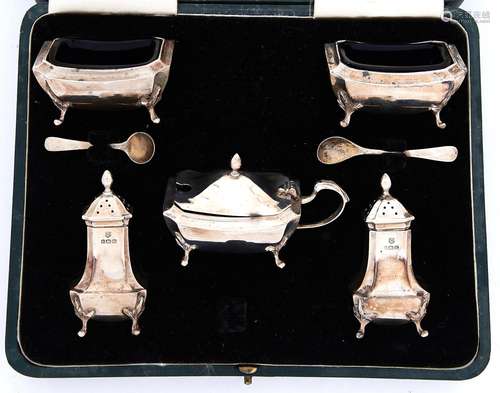 A George VI five piece silver condiment set, blue glass line...