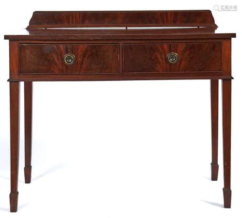 An Edwardian mahogany two drawer side table, c1910, the shap...