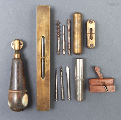 Tools and bygones. An English brass and steel plumb bob, ear...