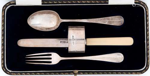 A George V silver child's christening set of spoon, fork, kn...