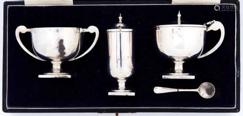 A George V silver trophy shaped condiment set, pepperette 82...