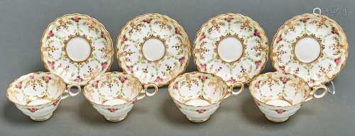 A set of four George Jones bone china teacups and saucers, e...