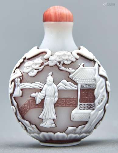 A Chinese triple overlay cameo glass snuff bottle, 20th c, i...