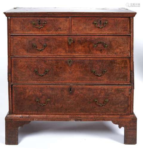 A George I walnut and feather banded chest of drawers, early...
