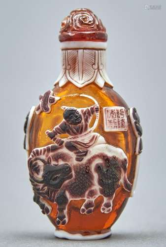 A Chinese triple overlay cameo glass snuff bottle, 20th c, i...