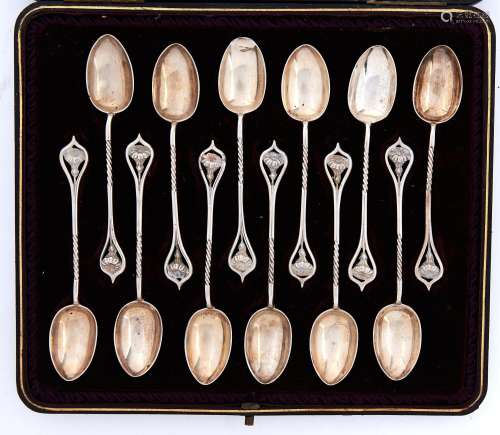 A set of twelve art nouveau silver coffee spoons, with flowe...