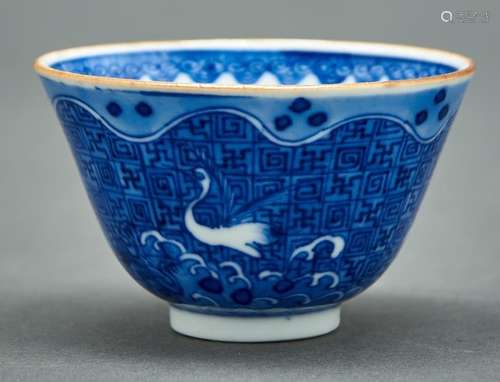 A Chinese blue and white wine cup, 19th / 20th c, painted wi...