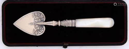 A Victorian mother of pearl hafted heart shaped silver servi...