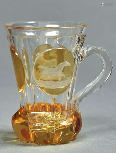 A Bohemian amber flashed glass mug, c1860, engraved to eithe...