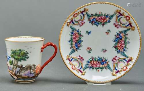 A German porcelain chocolate cup and saucer, early 20th c, m...