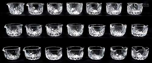 Twenty one English cut glass rincers, c1900, of typical doub...