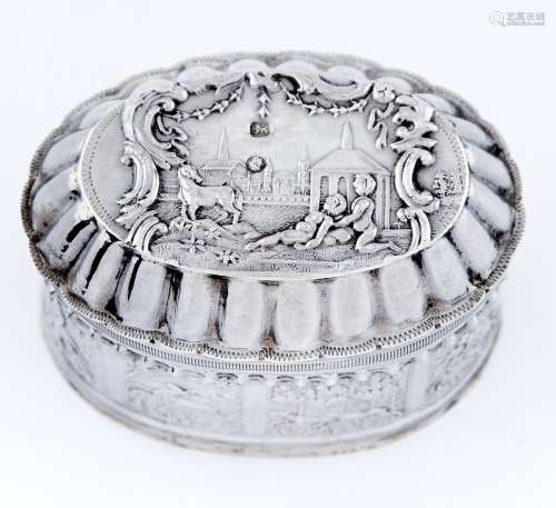 A Dutch decorative oval silver trinket box, the sides decora...