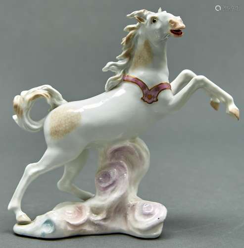 A Meissen model of a rearing chariot horse, 18th c, in pink ...