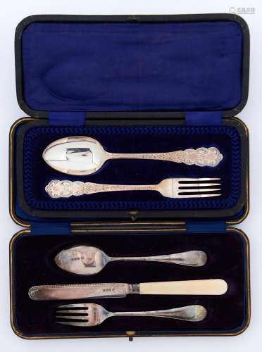 A George V silver child's spoon, fork and bone hafted knife,...