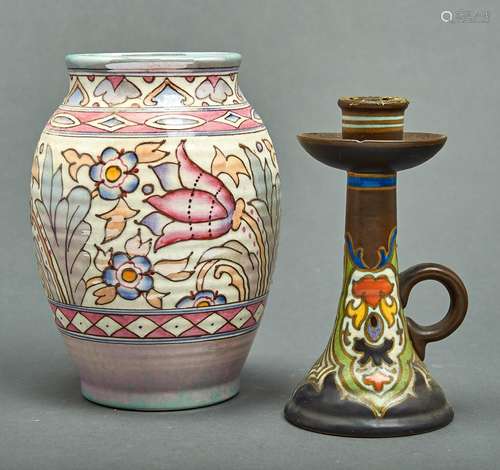 Charlotte Rhead. A Bursley ware ribbed baluster vase, slip t...