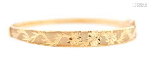 A 9ct gold bangle, 60mm, import marked Birmingham 1993, 5.6g...