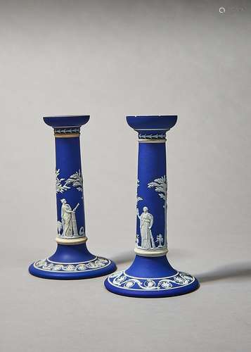 Two similar Wedgwood dark blue jasper dip candlesticks, earl...