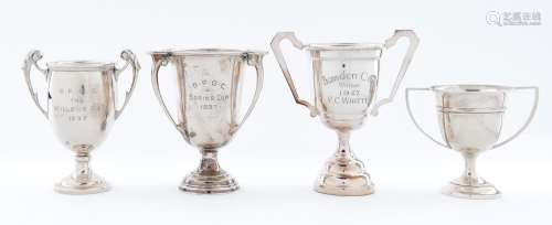 Four silver trophy cups, 11cm h and smaller, Birmingham, var...