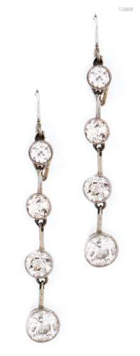 A pair of diamond earrings of four graduated, articulated ol...