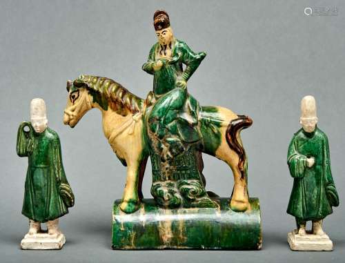 A Chinese Sancai glazed tileworks equestrian figure ridge ti...