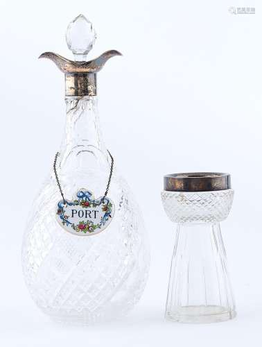 A George V silver mounted cut glass decanter and stopper, do...