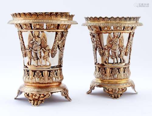 A pair of Italian silver gilt openwork vases, in Empire styl...