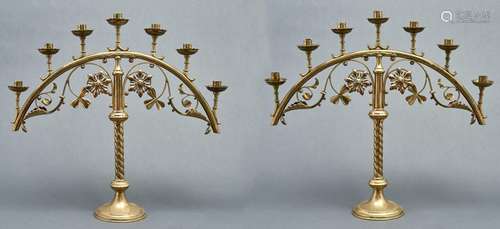 A pair of English gothic revival brass candelabra, late 19th...