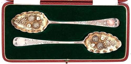A pair of George III silver tablespoons, later chased and gi...