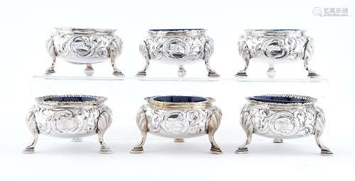 A set of six Scottish Victorian silver salt cellars, chased ...