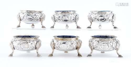 A set of six Scottish Victorian silver salt cellars, chased ...
