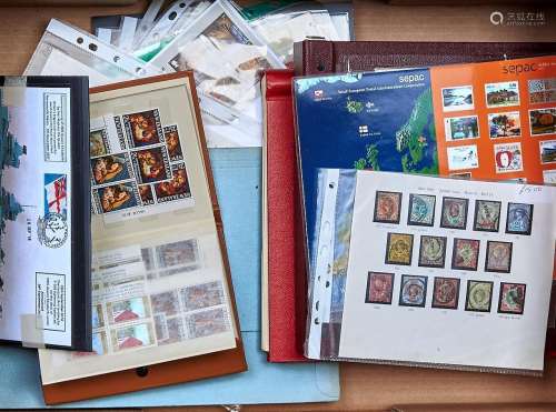 Postage stamps. A collection and miscellaneous ranges on lea...