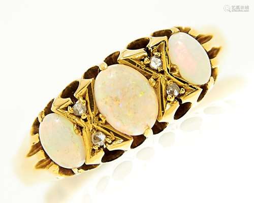 An opal and diamond ring, early 20th c, in 18ct gold, Birmin...