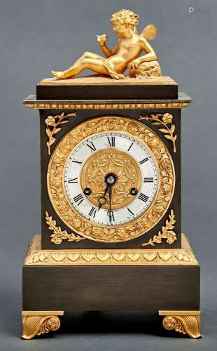 A French ormolu mounted bronze mantel clock, c1830, in Empir...