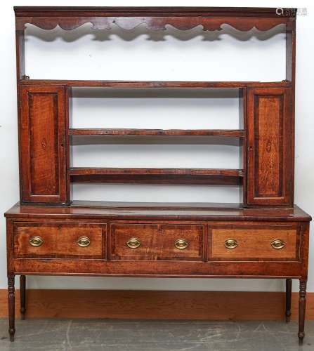 A George III oak dresser, early 19th c, inlaid with shell pa...