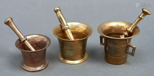 A bell metal and two brass pestles and mortars, 19th c, mort...