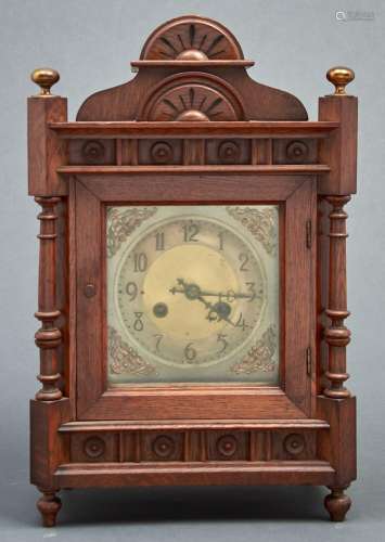 A Victorian oak cased mantel clock, c1890, with arched pedim...