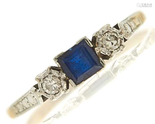 A sapphire and diamond ring, the step cut sapphire approxima...