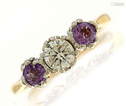 An amethyst and diamond three stone ring with round brillian...