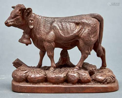 A well carved Swiss limewood model of a cow, early 20th c, n...
