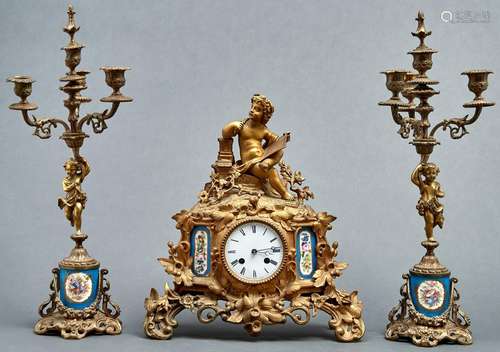 A French giltmetal and Sevres style porcelain inset mantel c...