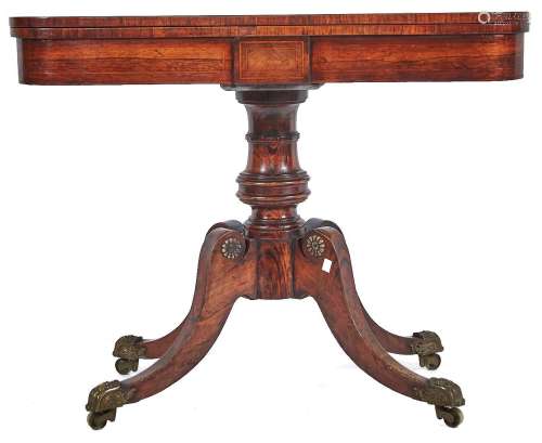 A George IV rosewood and line inlaid card table, the top wit...