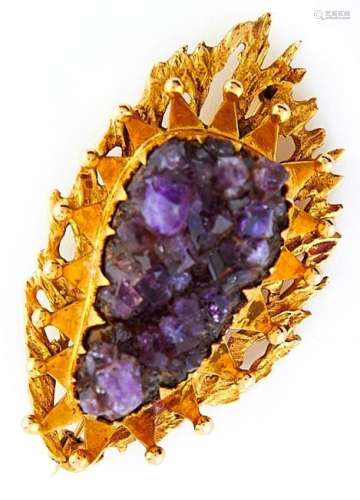 A modernist abstract amethyst brooch, in textured 9ct gold, ...