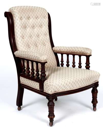 A Victorian mahogany armchair, the buttoned back between scr...