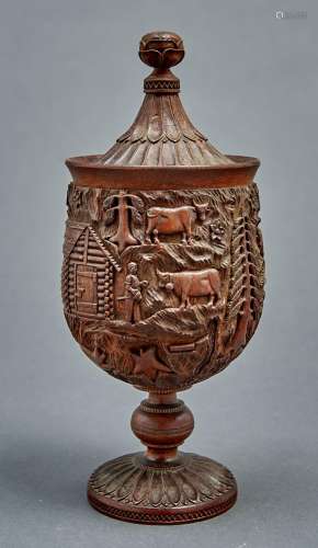 A Swiss or German turned and carved walnut cup and cover, c1...